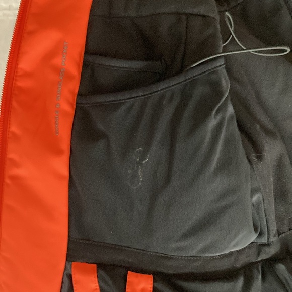 Kjus women’s ski jacket. Gorgeous, classic white with black & orange detailing. - Picture 7 of 9